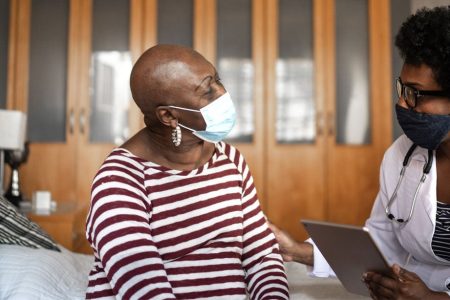 Caregiver-and-senior-african-american-woman-at-home_Hero_iStock-1266478952_2021-02_1336x614